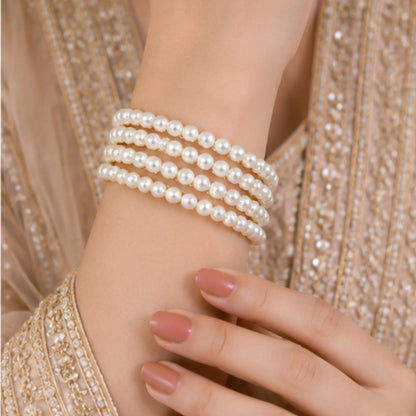 Classic White Pearl Bangles (Set of 4) – Graceful Gold-Tone Traditional Elegance