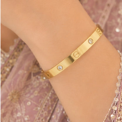 Iconic Luxury Roman Numeral Screw-Accent Bangle