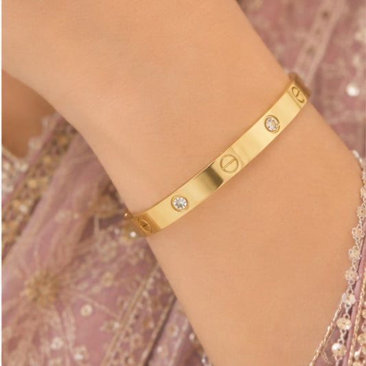Iconic Luxury Roman Numeral Screw-Accent Bangle