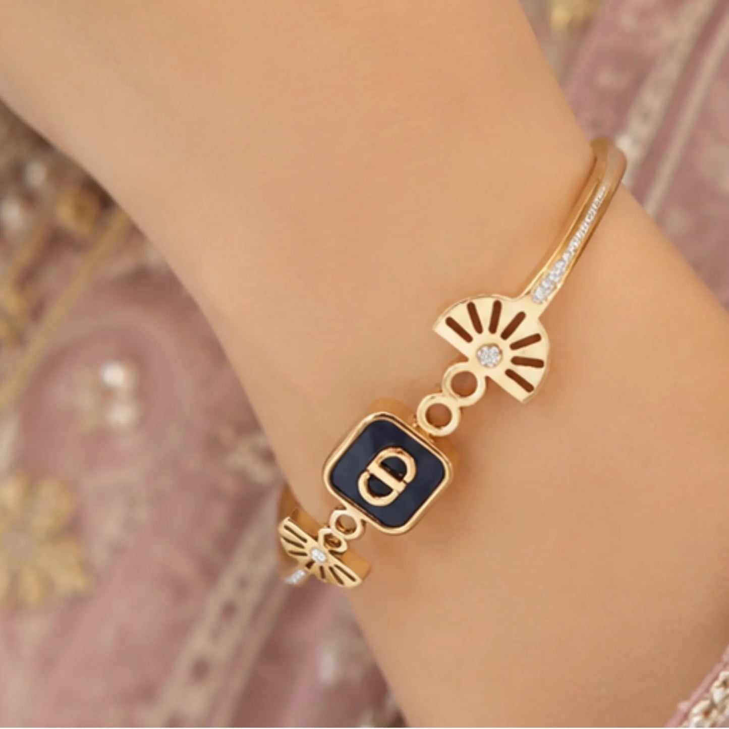 Elegant Gold-Toned Enamel Eclipse Cuff Bracelet