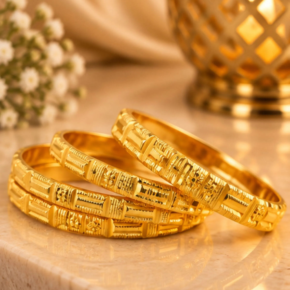 Elegant 4-Piece Gold Designer Bangles Set – Intricate Traditional Pattern