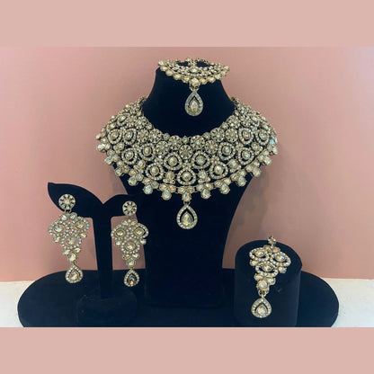 Golden necklace with peach stones