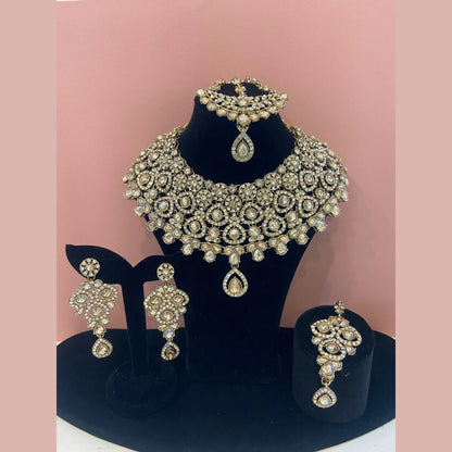 Golden necklace with peach stones