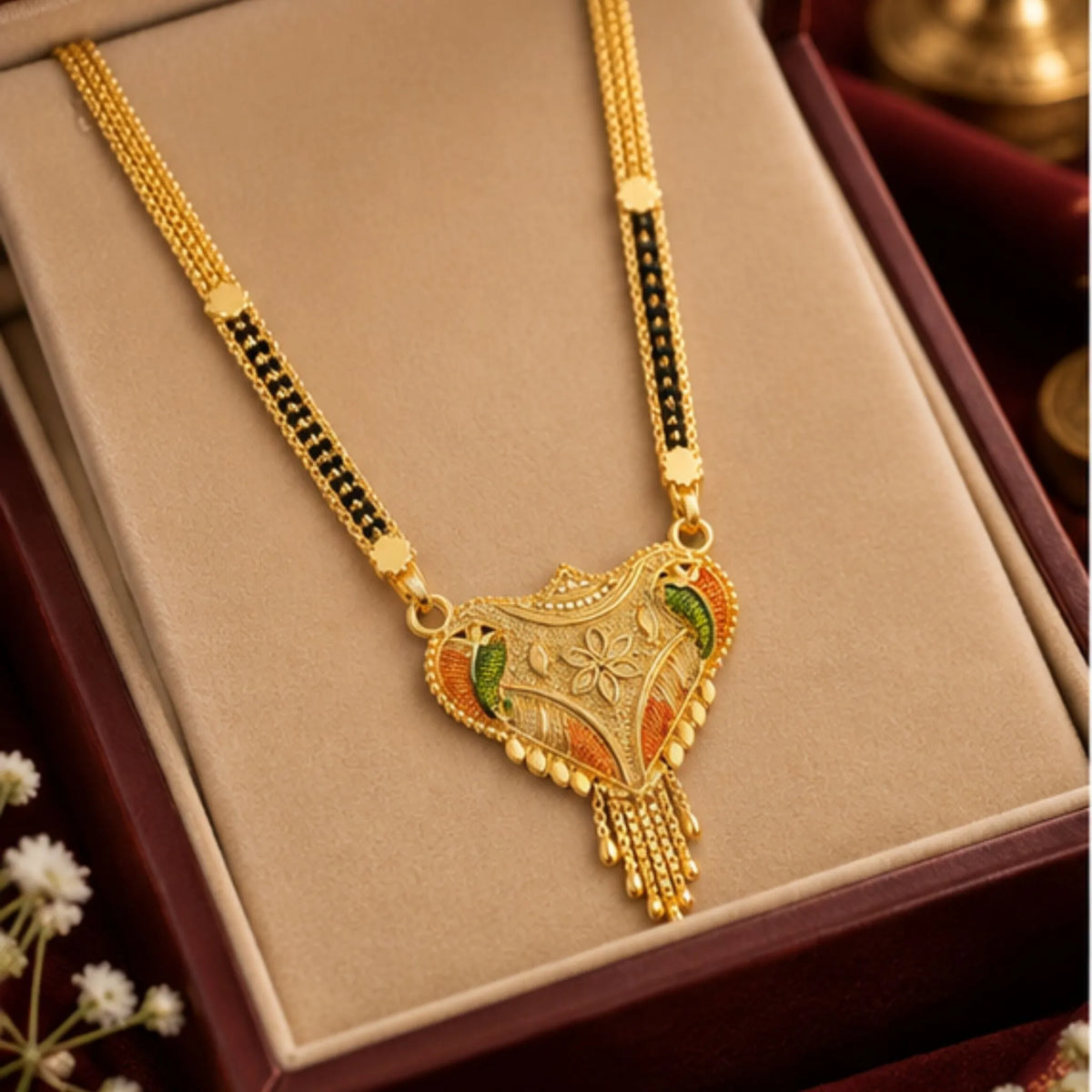 Gold Mangalsutra with Traditional Leaf-Detail Pendant & Black Beaded Chain