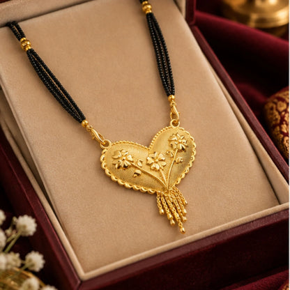 Traditional Gold Mangalsutra with Heart-Shaped Floral Pendant & Black Beaded Chain