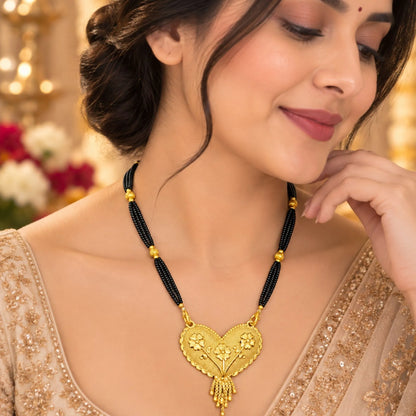 Traditional Gold Mangalsutra with Heart-Shaped Floral Pendant & Black Beaded Chain