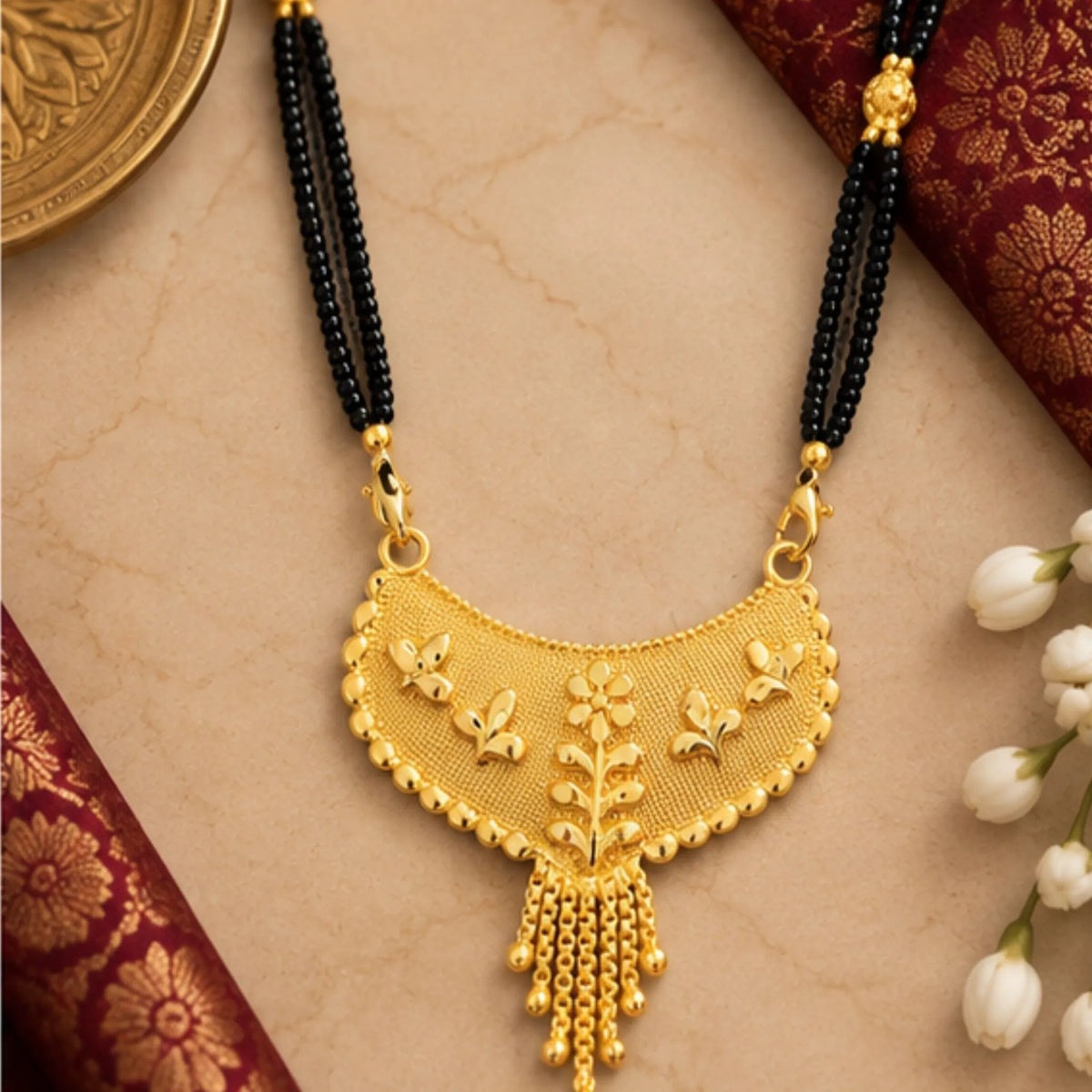 Traditional Gold Mangalsutra with Floral Fan-Shaped Pendant & Black Beaded Chain