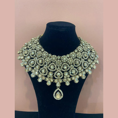 Golden necklace with peach stones