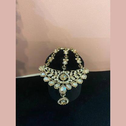 Golden necklace with peach stones