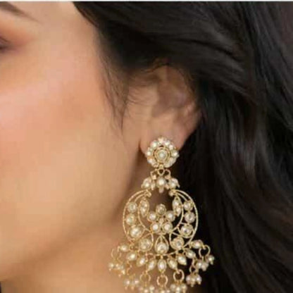 Gold pearl necklace with moon earrings and maang tikka