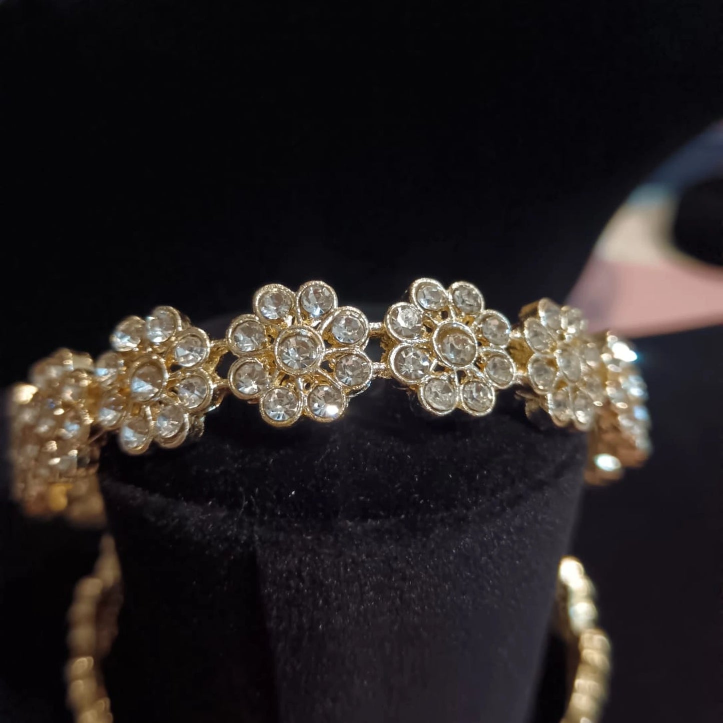 Floral Crystal Jhumka Earrings (Pair) – Elegant Gold-Tone Traditional Wear